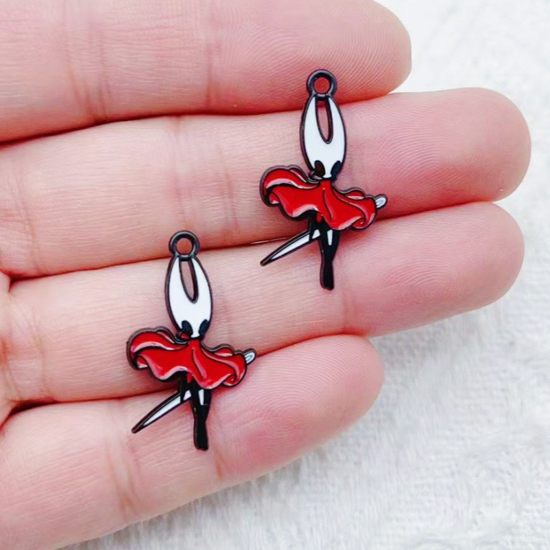 10 pendentifs en alliage motif - Party Games Event avis et prix