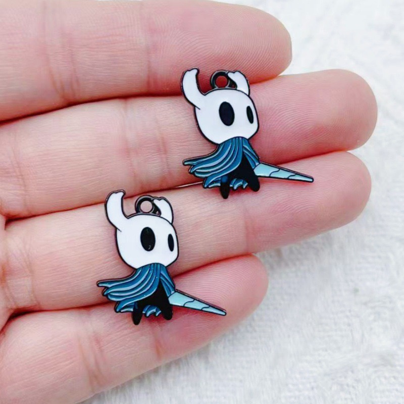 10 pendentifs en alliage motif - Party Games Event avis et prix